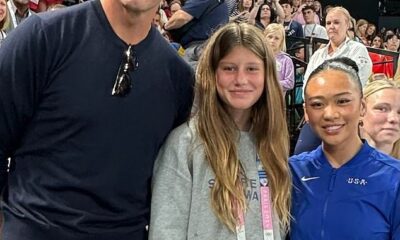 Breaking News: Tom Brady gushes over 'once in a lifetime' Olympics trip to Paris with daughter Vivian as NFL legend shares snaps with Suni Lee, at the Eiffel Tower - and THAT viral Simone Biles reaction...see more