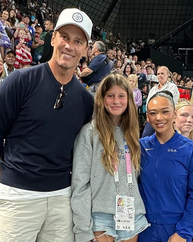 Breaking News: Tom Brady gushes over 'once in a lifetime' Olympics trip to Paris with daughter Vivian as NFL legend shares snaps with Suni Lee, at the Eiffel Tower - and THAT viral Simone Biles reaction...see more