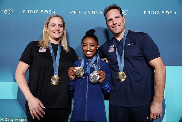 Amazing: Simone Biles' coach hits out at Olympics judges after giving Team USA gymnast 'harsh' penalty in the balance beam final