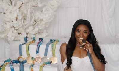 Congratulations:Simone Biles Poses with Her Medals in Mini White Dress...see more 👇